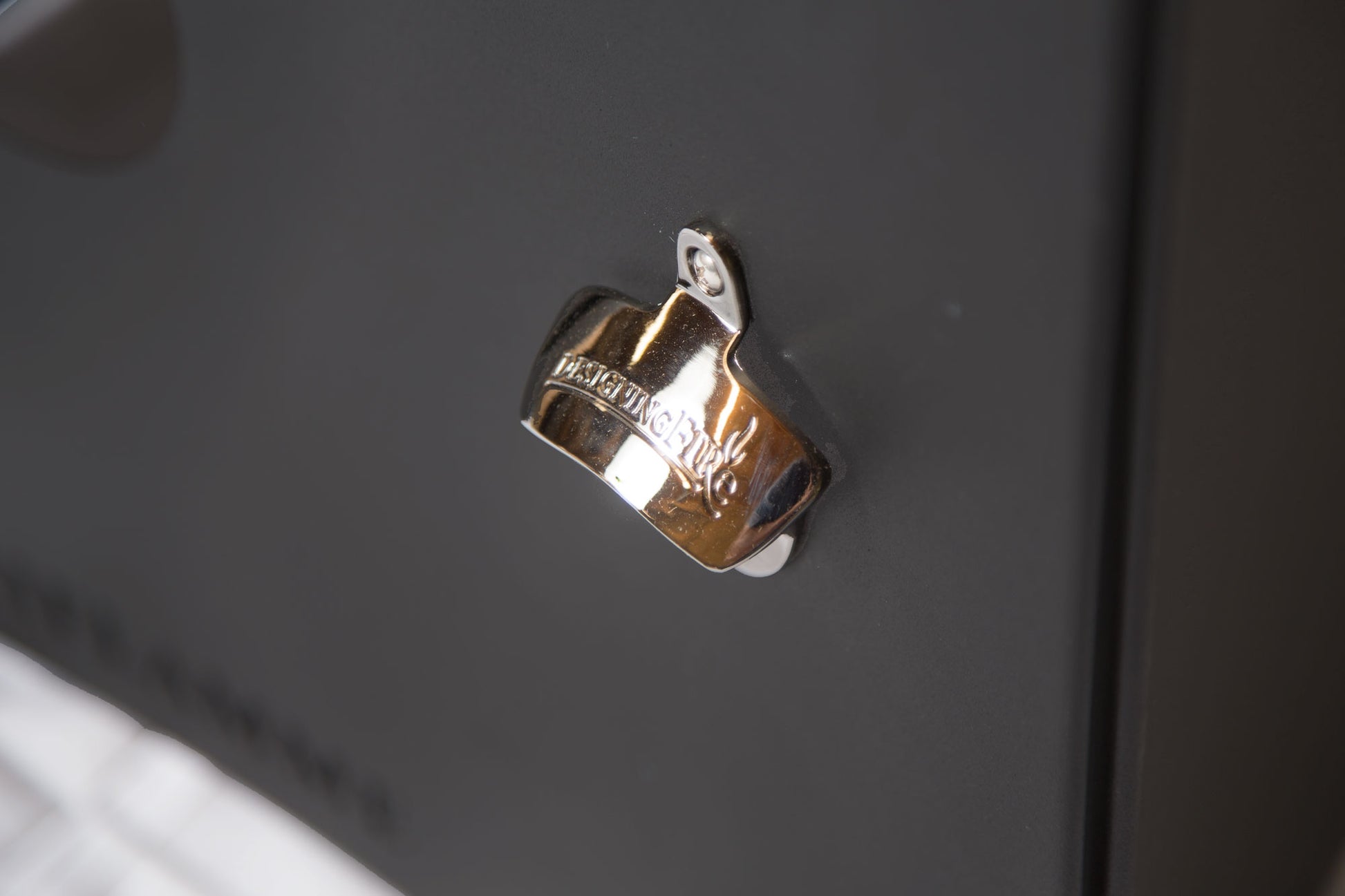 Oriflamme Bottle Opener on Black Base