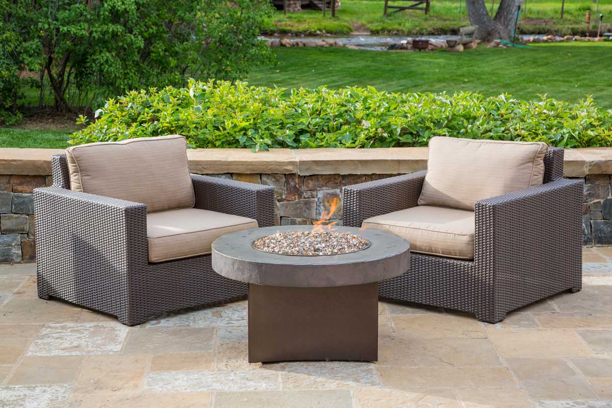 Malibu Collection Wicker Club Chair around an Oriflamme fire table