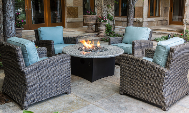 Santo oriflamme fire table paired with Bainbridge club chairs. 