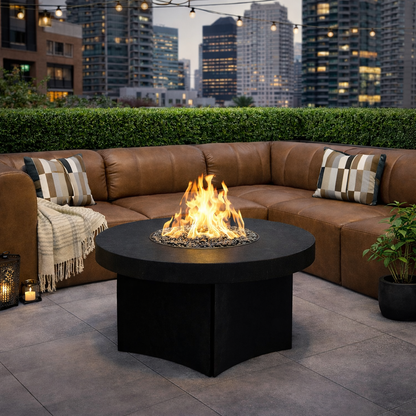 Outdoor patio with brown lasso outdoor sectional sofa, oriflamme fire pit table, and city skyline in the background.